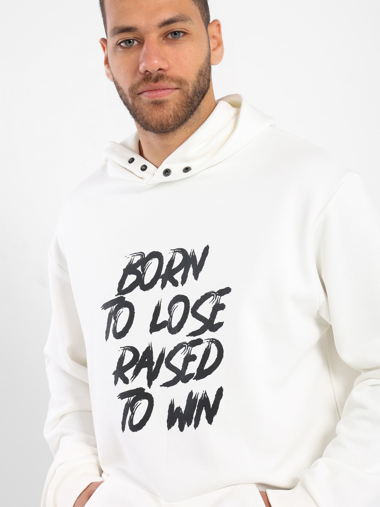 Raised To Win Print Hoodie With Woven Badge On Pocket - Outlet
