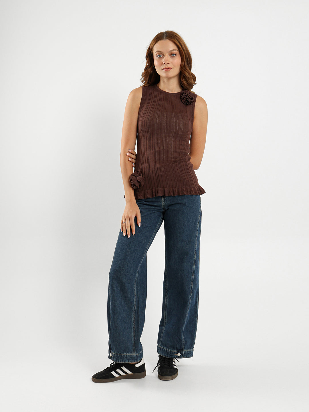 Sleeveless Top With Ruffle Hem And Flower Trim