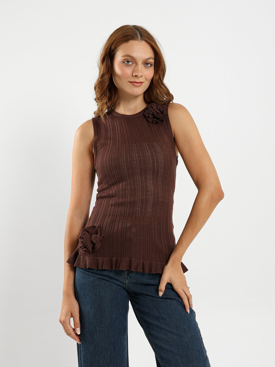 Sleeveless Top With Ruffle Hem And Flower Trim