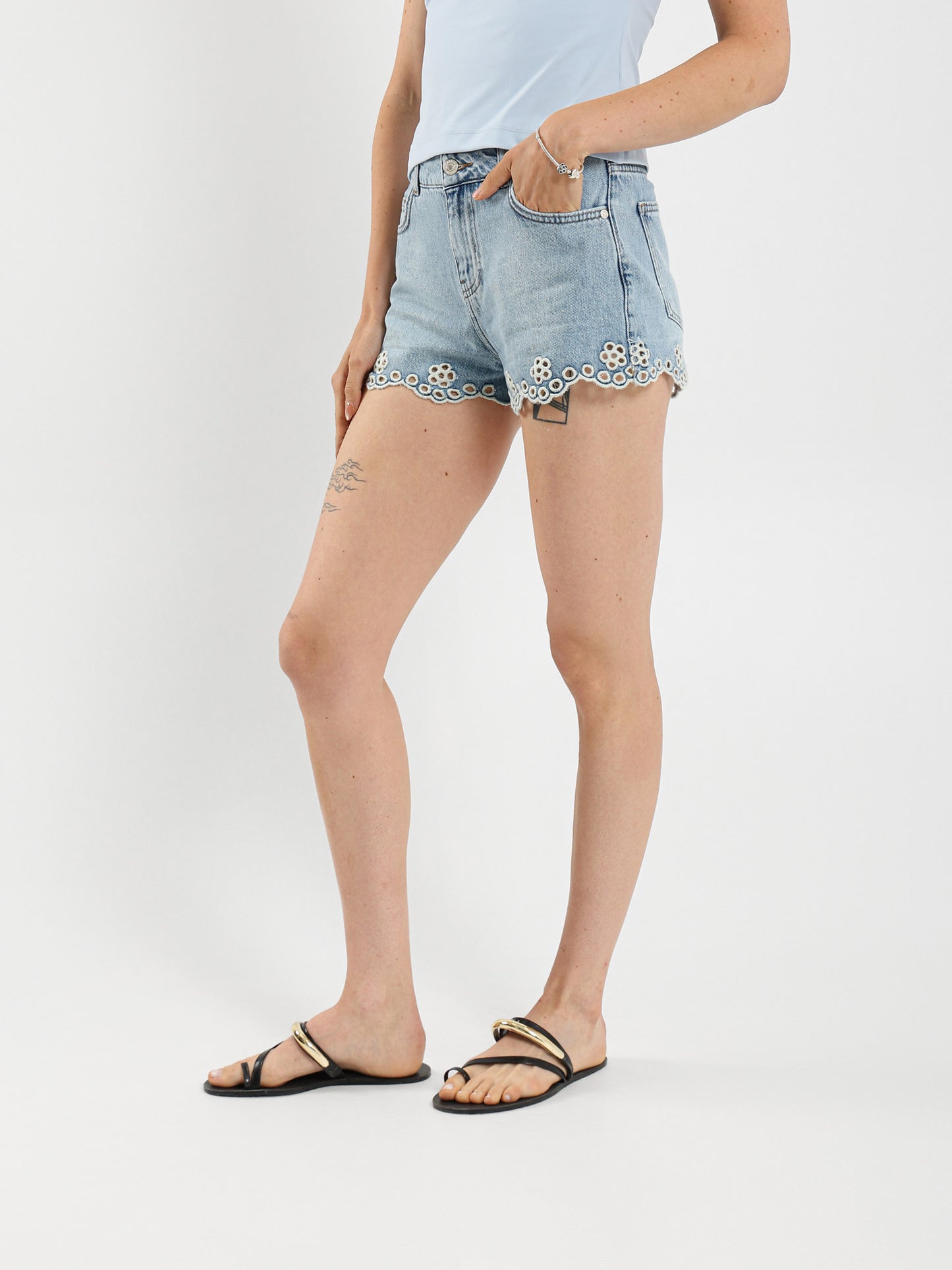 Denim Shorts With Floral Embroidery On Hem
